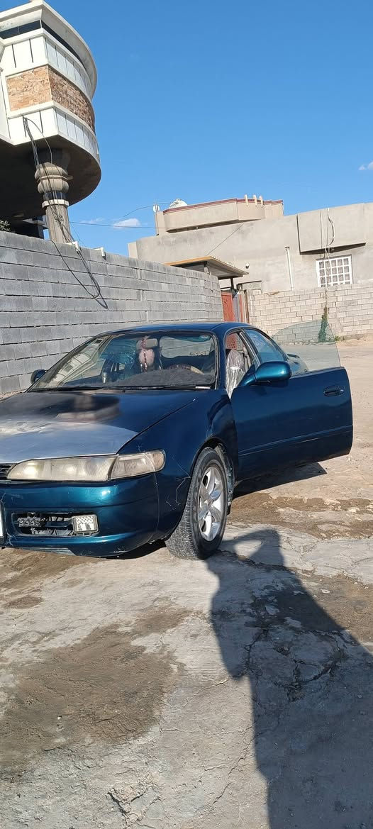 توتوتا كورلا  موديل 1992  محرك جديد كير اوتو  جديد صدر  جديد بيع او  مراوس *********** عنوان الرمادي
