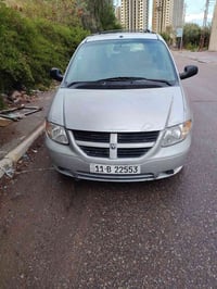 دوج كرفان بسمي موديل 2007 محرك كير تبرير 3قطع جيد جدا بيه جاملغ تبديل ...