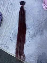 شعر طبيعي • طويل • ٣٦ خصلة