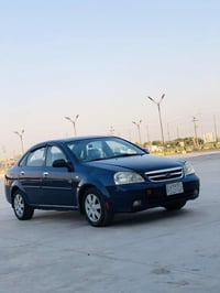 سياره اوبترا موديل 2004كير عادي رقم بغداد شرط التحويل رقم بغداد مصبوغه...