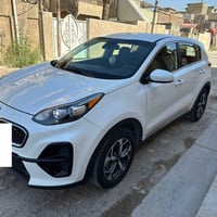 كيا سبورتج موديل ،2022 اللون صدفي . السيارة باسمي صور الحادث مرفقة بال...