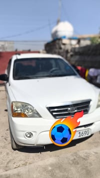 سورينتو ٢٠٠٨ • بيضاء • حادث بابين
