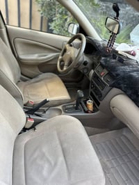 نيسان سني ياباني 2009السيارة ماشية180 السيارة نظيفة إلى درجة السعر112و...