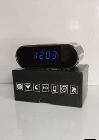 كاميرا مراقبة مخفية داخل منبه وساعة  تعمل على  البرنامج  يمكن وصلها عل...