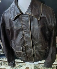 جلد رجالي • مقاس L • بني