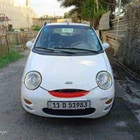 من رخصت ال ادمن  كيو كيو موديل 2012 رقم بغداد نكليزي كير او تماتيك مكي...