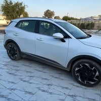 سبورتج 2024 ماشيه 65 الف صبغ ربع بنيد اثر طابوكه  كفاله السياره من كلش...