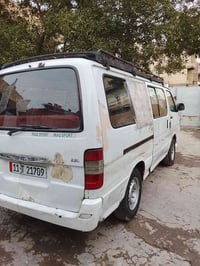 جنبي باص • ٢٠١٠ • ورقة