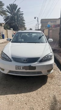 كامري ٢٠٠٦ • مكينة ٢٤٠٠ • رقم بغداد