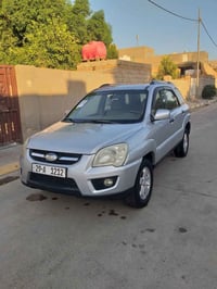 كيا سبورتج 2009 خليجي رقم واسط  مميز بأسمي مكفوله   ( السيارة فول مواص...