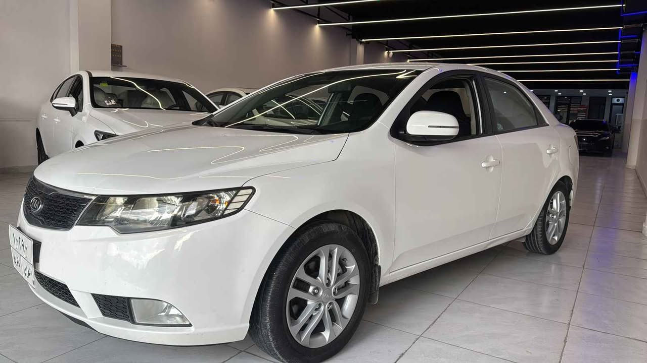 كيا سيراتو 2012 لون ابيض قطعه صبغ مكينه وكير مكفولين سعر 107 ومجال ***********.       *********** دهوك, العراق
