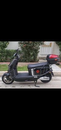 دراجة كهربائية • هاتف