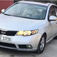 كيا فورتي 2010 للبيع صبغ عام جمالية  كير ومحرك شرط تخم جديد  السيارة ر...