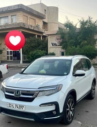 هوندا بايلوت ياباني ٢٠٢٢  ٧راكب  تورنك  أعلى المواصفات    ماشيه ٦٣ الف...