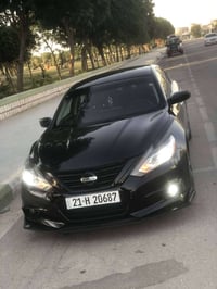 ألتيما • ٨١٠٠٠ ميل • شاشة آيباد