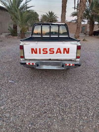 بيكم نيسان • 2004 • مزاد الداخلية