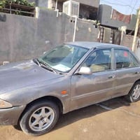 بروتون ويراء ٢٠٠٢ رقم بغداد بيها رنكات سعر ٣٠ وبيه مجال حك الجيه بسمنا...