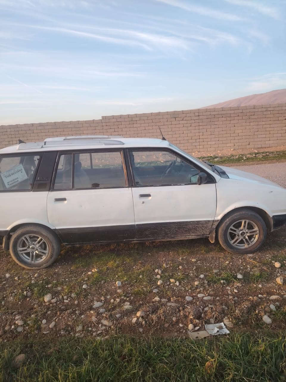 مستبوشي ستيشن 7راكب موديل ٩١ محرك كير شرط رقم نينوى سنويه  2026 البارحه استلمتها بأسمي تدفئه شغال باتري جديد كشرها نضيف بيها خيسان دوسات وطخمها تعبان  السعر 18 وبيها مجال شراي خابر ***********
