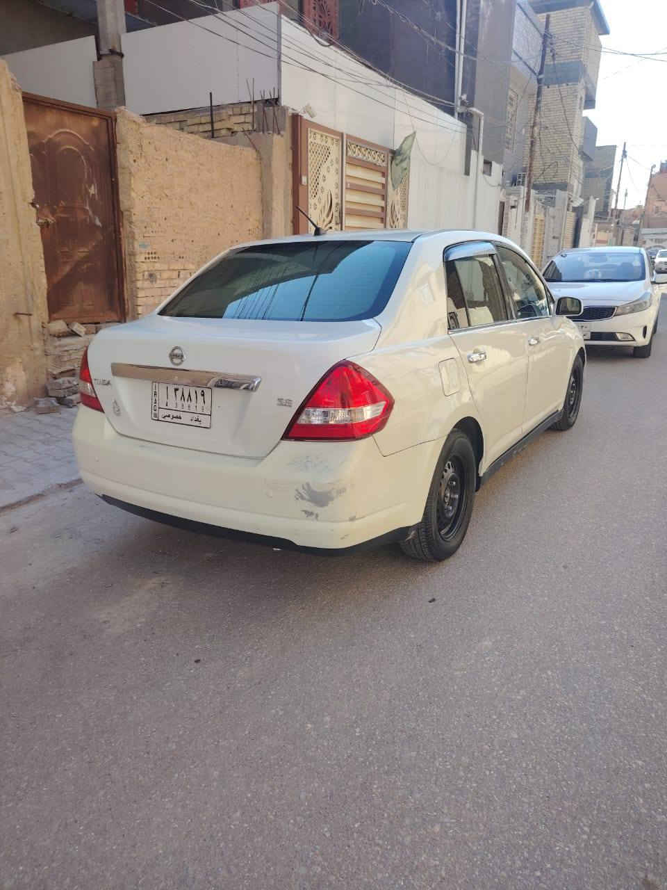 ***********نيسان تيده 2009 بيها جاملغ الخلفي والباب والباقي كفاله جديده كير مكينه حداديه السعر ٧٣ مكان النجف حي الجمعيه
