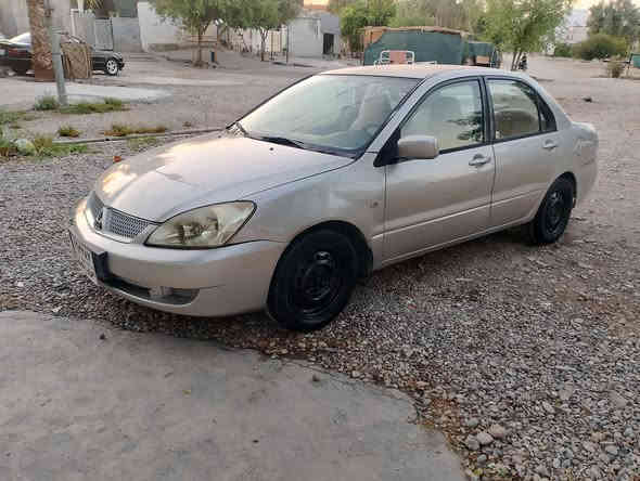 لانسر 2007 مکینە بچوك حیزام بۆیاخ بی معجۆن بی لی دراو بۆجوانی کراوە گیرمکینە تبریدبشرت سعری 65ورقه شوین کلار***********
