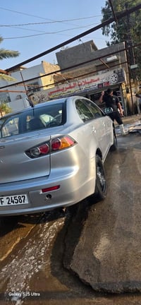 لانسر قرش 2016 السياره مكفول عدا ذني الي مبينات بصور كير مكينه تبريد ص...