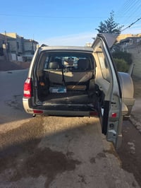 باجيرو ٢٠٠٤ محرك ٣٨٠٠ دفع رباعي رقم بغداد مميز جدا ثلاث قطع تبريد فتحة...