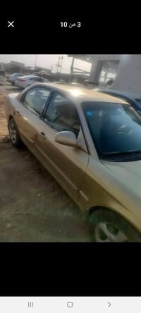 اوبتيما • ٢٠٠٢ • مكينه ٢٠٠٠