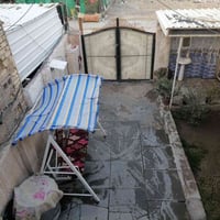 خلف جامع النور • يم عباس الحجام • ١٥٠م