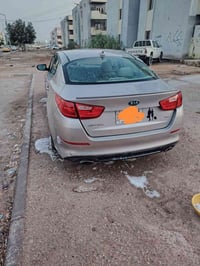 كيا اوبتيما 2014 أمريكي محرك 2400 GDI گير أوتوماتيك 6 سرعات  لون سلفري...