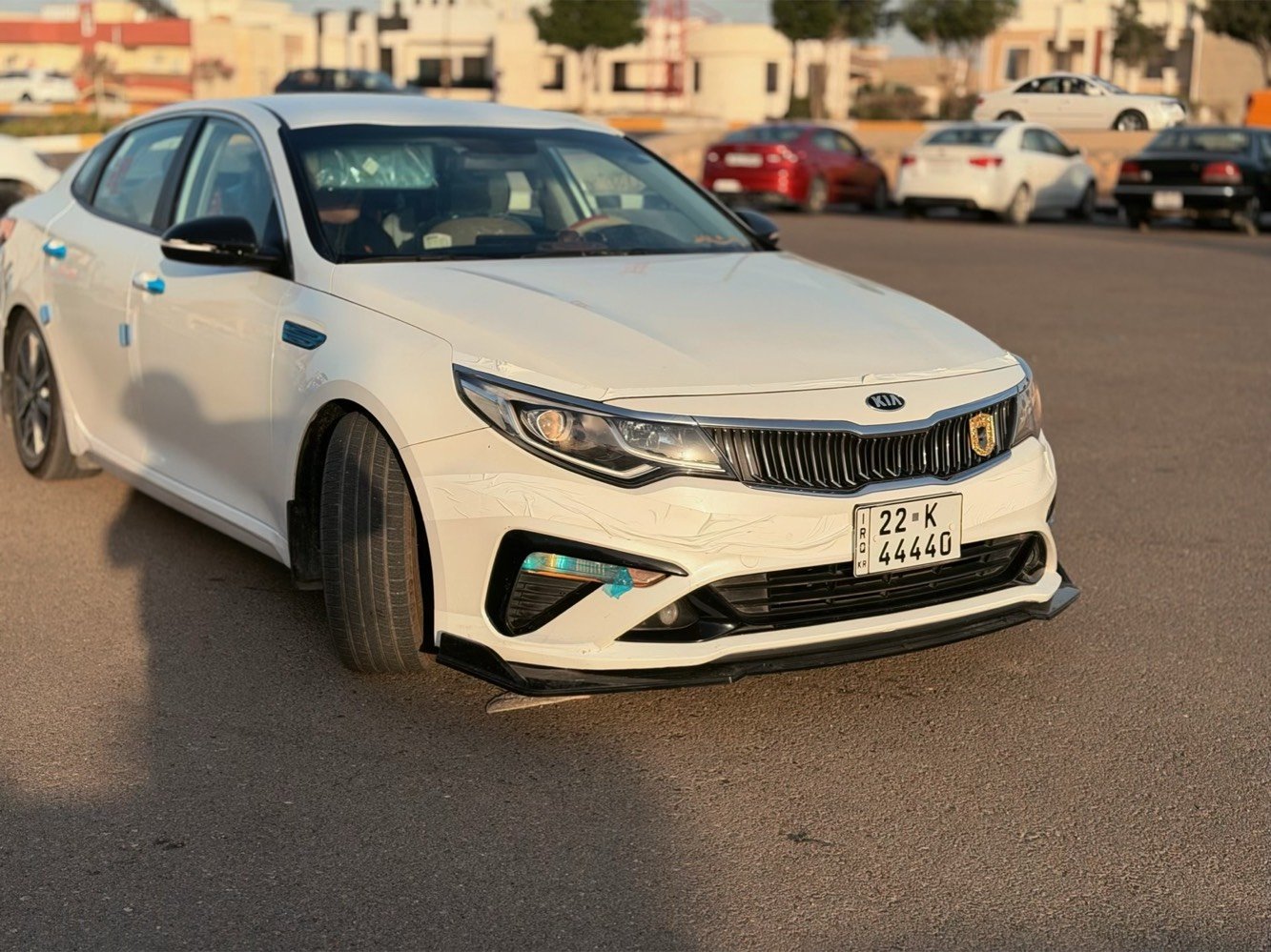 ✨ للبيع كيا اوبتيما خليجي 2019 ✨✨

✨ محرك 2400 DOHC - 185 حصان ✨✨



✨ ويل 18 انج ✨ رقم مميز ✨✨



**المواصفات الميكانيكية:**



✨ المحرك: 4 سلندر 2.4L DOHC 16V MPI



✨ القوة: 185 حصان @ 6000 rpm



✨ العزم: 241 نيوتن.م @ 4000 rpm



✨ الگير: 6 سرعات اوتوماتيك سبورتماتك + تبترونك



✨ وضعيات القيادة: Eco / Normal / Sport



✨ الدفع: امامي FWD



✨ الصرف: 24 داخل / 33 خارج / 27 مشترك MPG



✨ التانكي: 70 لتر



✨ الباتري: 80 امبير AGM



**الابعاد:**



✨ الطول: 4855 ملم



✨ العرض: 1860 ملم  



✨ الارتفاع: 1465 ملم



✨ قاعدة العجلات: 2805 ملم



✨ الخلوص: 135 ملم



✨ الصندوق: 450 لتر



✨ الوزن: 1465 كغم



**المواصفات الخارجية:**



✨ ويلات 18 انج المنيوم دايموند كت



✨ تايرات 235/45R18 جديدة



✨ اضوية امامية ليد بروجكتر + DRL



✨ اضوية خلفية ليد



✨ مري كهربائية + تدفئة + طي + اشارة



✨ حساسات خلفية + كاميرا HD



✨ بصمة ابواب + تشغيل عن بعد + دخول ذكي



✨ فول مواصفات عدا البنوراما



**الداخلية والرفاهية:**



✨ شاشة 8 انج لمس + GPS + CarPlay + Android Auto



✨ بلوتوث + USB + AUX + 6 سماعات + صب ووفر



✨ تكييف ثنائي Dual Zone + فتحات خلفية



✨ تدفئة ستيرن + تدفئة مقاعد امامية



✨ مقاعد جلد + كهربائية + ميموري للسائق



✨ كروز كنترول + تحكم ستيرن



✨ زجاج كهربائي اوتو 4 ابواب



✨ مراية وسط تعتيم تلقائي



✨ اضاءة داخلية ليد + ستائر خلفية



**الامان:**



✨ 6 ايرباك



✨ ABS + EBD + BA + ESC + TCS



✨ النقطة العمياء BSM



✨ مغادرة المسار LKA  



✨ تنبيه المرور الخلفي RCTA



✨ حساسات ضغط الاطارات TPMS



**حالة السيارة:**



✨ نظيفة جدا شرط الفحص 

✨ صيانة وكالة وماشية قليل



**السعر:** 188 ورقة وبيها مجال



**المكان:** الانبار - الحبانية



**رقم الهاتف:** ***********



✨ اتصال + واتساب ✨