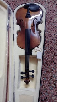 كمان • آلة موسيقية