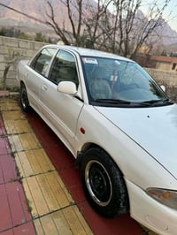 پرۆتۆن • ٢٠٠٢ • دهان