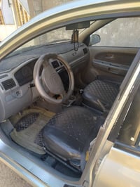 للبيع كيا ريو ٢٠٠٤ رقم بغداد سنويه لغايه ٣٠ كير عادي مكينه وكير وصدر و...