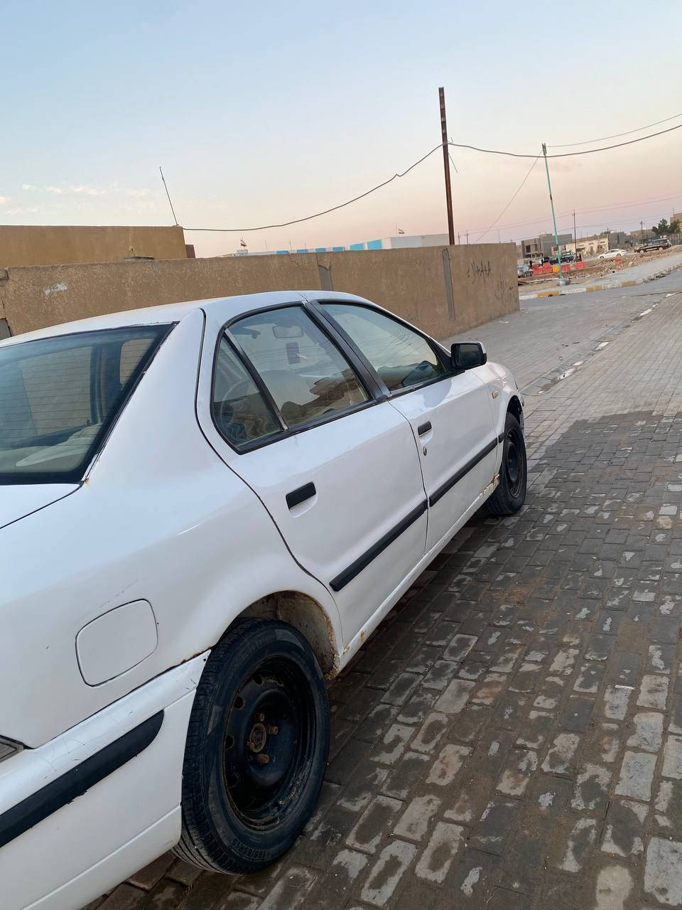 السلام عليكم سمند موديل 11لون ابيض مكينه كير حداديه تخم تاير دواخل بلاد مصبوغه عام تبريد معوز غاز رقم ذي قار ألماني بيع مستعجل مكلف بل نشر السعر 26$وبيه مجال حك الجيه العوان الديوانيه الرقم ***********
