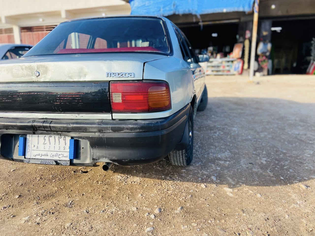 سلام عليكم 
سياره مازده حجم 323 موديل 1993  سياره بلاديه مابيه لا ضربه ولا صبغ صدر تمام محرك تمام كير تمام تخم تاير السياره مابيه نقص برقي تحويل ثاني يوم ترايك وين مايعجبك السياره  السعر 36 وبيه مجال شويه  العنوان الضلوعيه ***********
