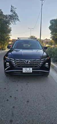 توسان 2024 هايبرد SEL لون [حبري ] محرك 1600 توربو   حادث بسيط بالباب ا...