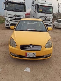 اكسنت  موديل 2008 رقم بغداد الدولي باقي ع استلام اللوحات  هزه و سنويه ...