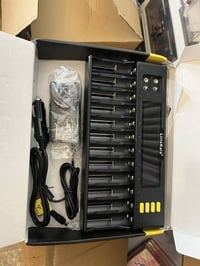 شاحن بطاريات • كهرباء وولاعة • مزاد