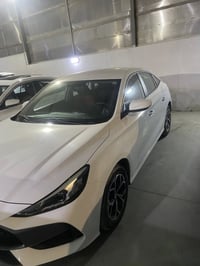 ئێم جی  MG GT 2025 Sport گێڕ عادی هیچی پیوەنی   مواصفات.بەصمة.شاشەوكام...