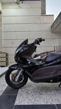دراجة PCX • جيل أول • سكوتر