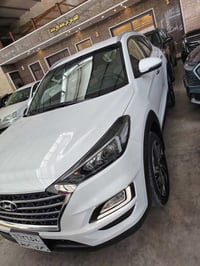 توسان ٢٠٢١ ماشيه ٦٥الف كفاله عامه جديده جدااا بصمه كشنات كهرباء شاشه ك...