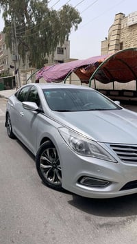 أزيرا ٢٠١٤ • ٦ سلندر ٣٣٠٠ • ماشية ٩٦ ألف