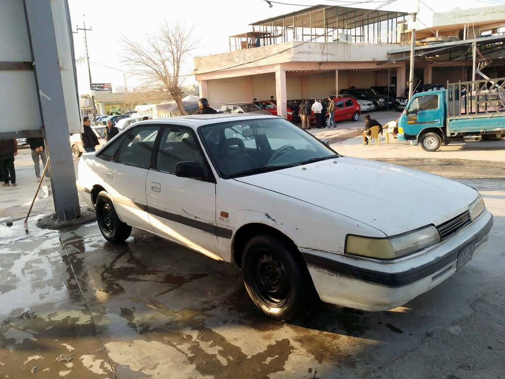 مازدا 8 و به غ
1992 
***********
***********
ارمي كوني اسايش 
به شه رتي اوليات
گيرو مه كينه ي به شه رت 
تايه ي تازه يه 
من كينه ي لوكي بو بن ستراوه 
سليماني هه واري شار 
ناوي زور جوان 
15 معامه له السليمانية, العراق
