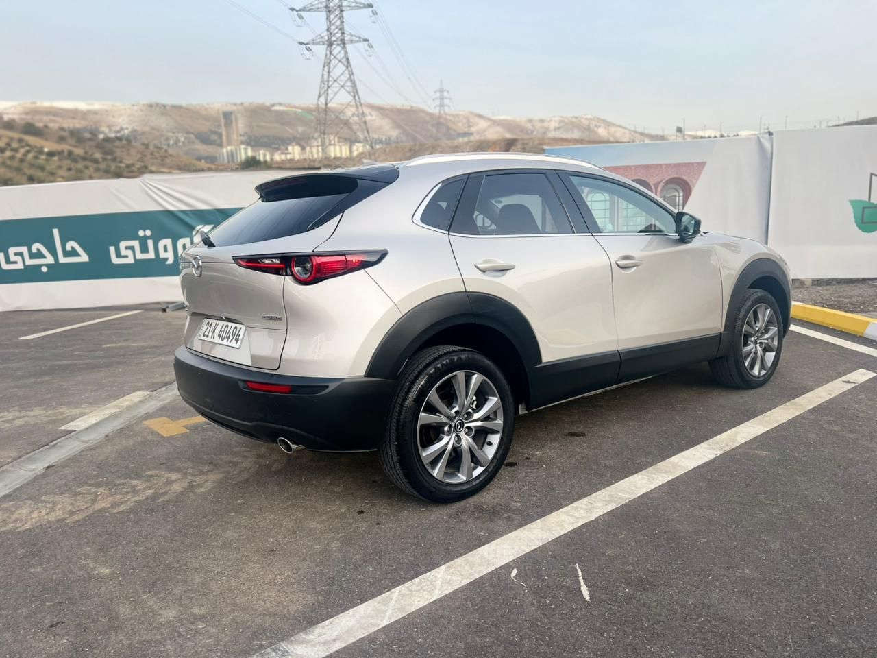 Mazda CX-30 premium 2024 
یەک پارچەی بۆیاخ
فول مواسەفات
ڕادار ٫ داتاشۆ ، سندوق شەفت، سڵایت ، کوشن کارەبا خەزن هیتەر  ، دەبڵ ئەکسل ، دوو مۆدی لێخوڕین ، موکەبەرەی بۆس، پێشی کەپس. زۆر مواسەفاتی تر

3MVDMBDM4RM662980  : ڕەقەم شاسی 
نرخ : $17400
*********** - WhatsApp
