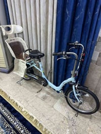 بايسكل تكسي للبيع برجستون لشه طويله لون سمائي نضافه90% كله شغال ابيع ه...