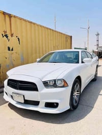 جارجر موديل 14 سيارة بيه رش جاملغ وباب والباقي كفالة سيارة جديدة وجاهز...