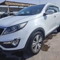 سبورتاج ٢٠١٥ • ٩٠٠٠٠ كم • كفالة عامة