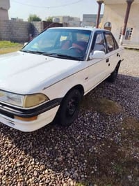 كورلا للبيع رقم نينوى جديد بسمي هزه جديد شرط الوكالة ولتحويل  كير محرك...