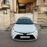 كورلا هايبرد شكل الامريكي 2025  فول مواصفات 1/1  رقم بغداد بأسمي تحويل...