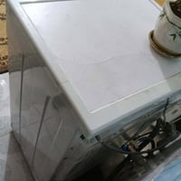 غسالة اوتماتيك • شغال • مزنجر من جوه